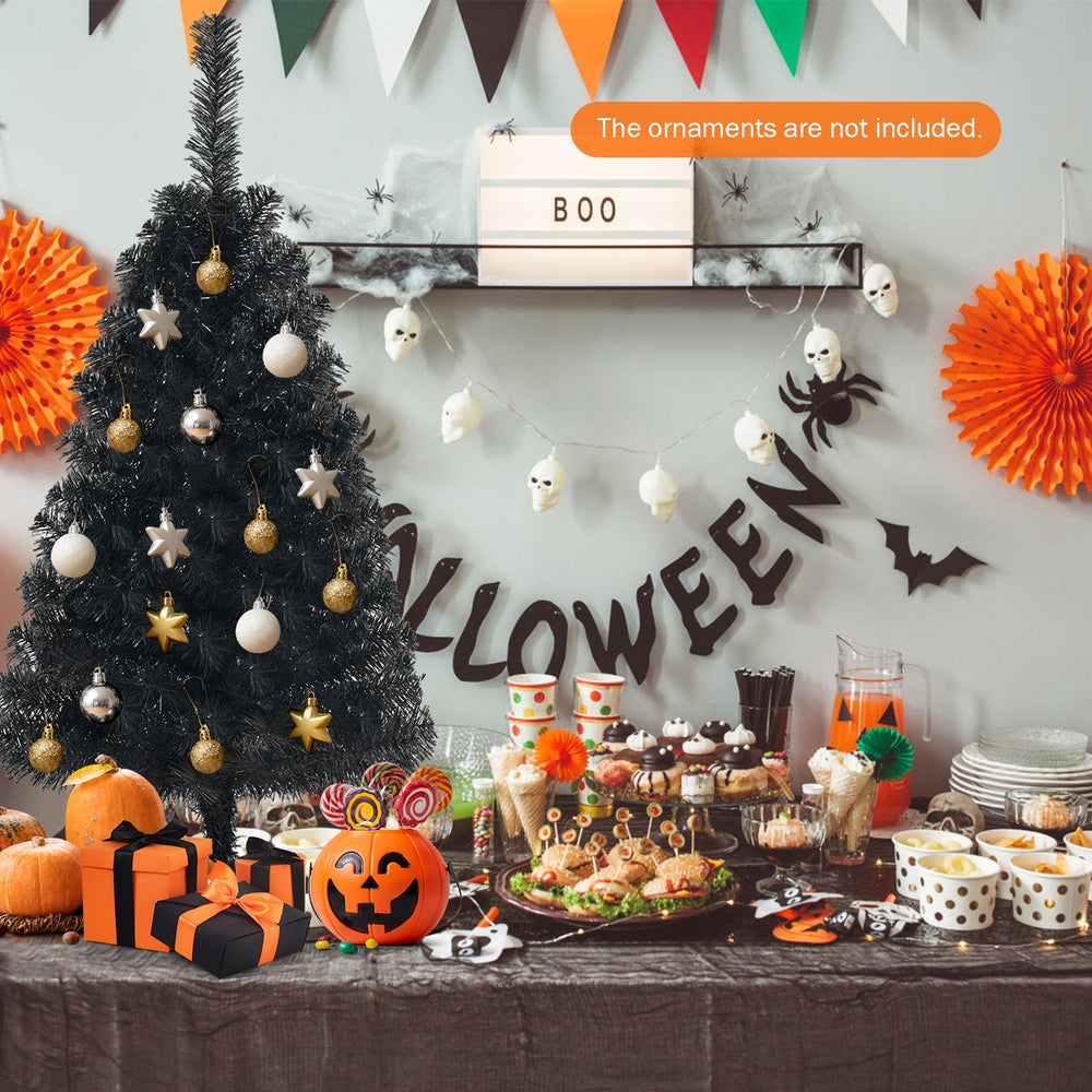 Mini black artificial tree with 116 branch tips and triangular base, designed for Halloween and Christmas celebrations.