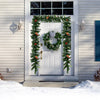 9FT pre-lit artificial Christmas garland adorned with red berries and pine cones, designed for vibrant holiday.