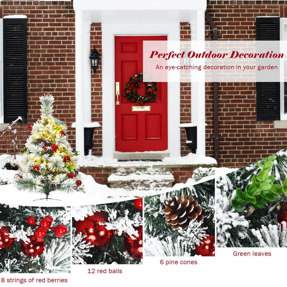 Pre-lit 2-foot flocked Christmas tree with 12 red balls, 6 pine cones, and 30 warm LED lights for festive outdoor.