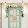 9-foot pre-lit artificial Christmas garland with 50 LED lights, featuring snow flocking, white flowers, and berries for.