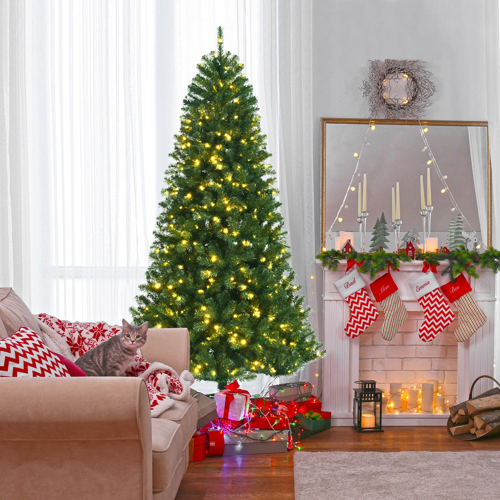 Full view of a 7' artificial Christmas tree with remote-controlled color-changing LED lights, decorated for the.
