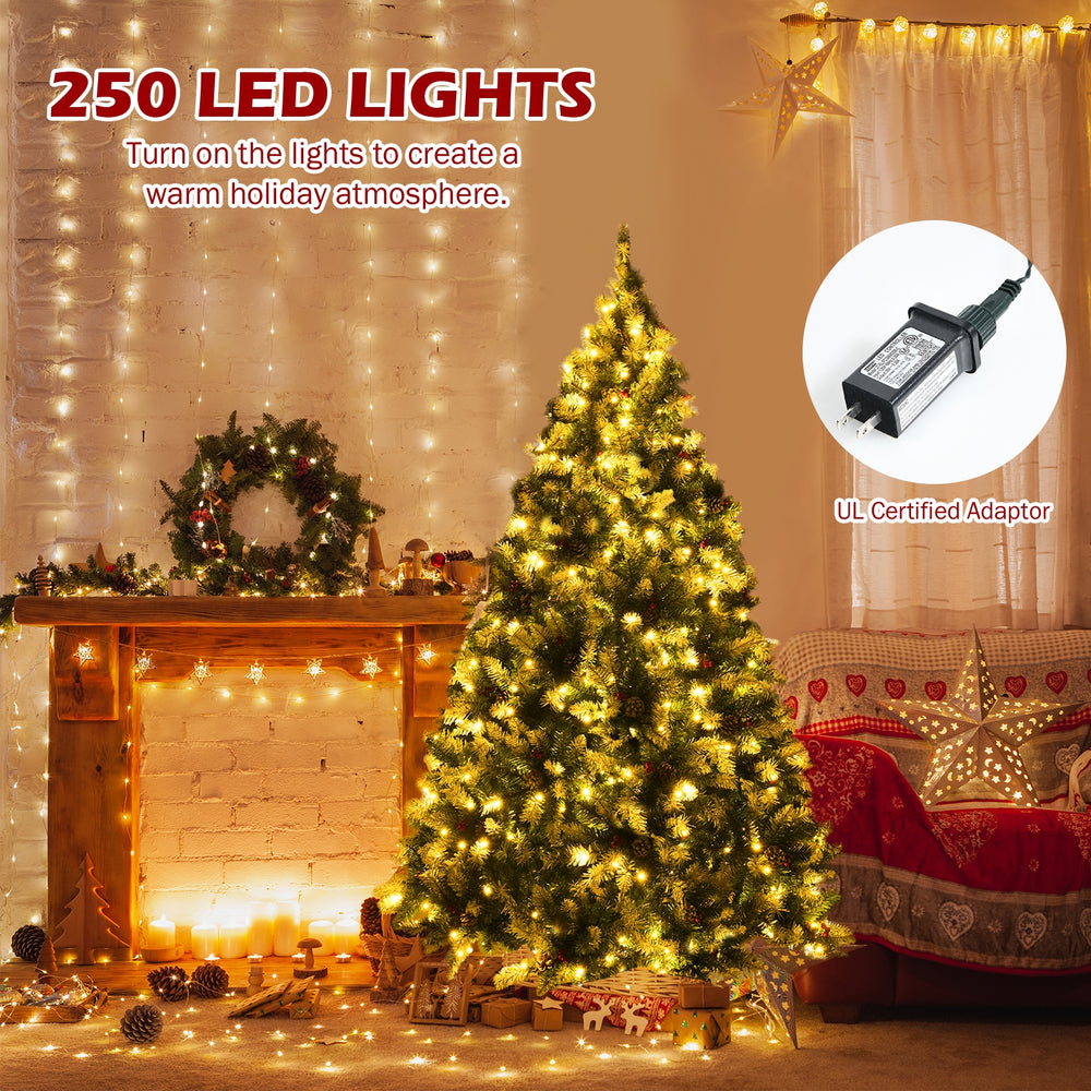 Pre-lit 6 ft snow flocked Christmas tree with 250 warm white LED lights, red berries, and pine cones for festive decor.