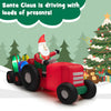 Santa Claus in a tractor with gifts, 9 feet long, bright LED lights, perfect for festive outdoor holiday decoration.