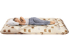 Foldable full-size futon mattress with washable cover, shown in a cozy bedroom setting, ideal for camping or home use.