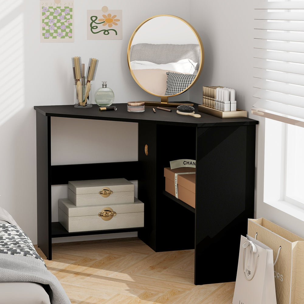 Black corner computer desk with triangle design, storage shelf, and cable management for organized workspace.