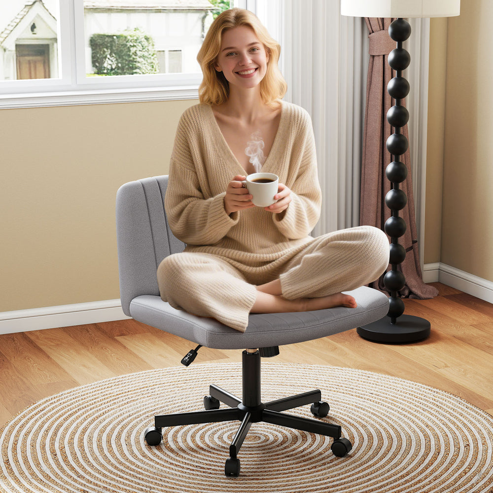 Cross-legged swivel desk chair with soft-padded wide seat in gray, perfect for comfortable home office use.