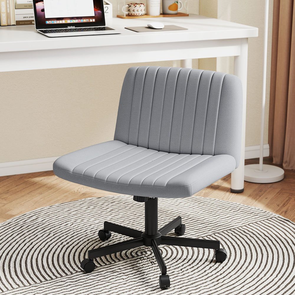 Gray Criss Cross Chair with wheels features a wide seat and contoured shape, perfect for cross-legged comfort in any.