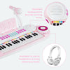 Multifunctional pink electric keyboard piano with 37 keys, microphone, and headphone jack for immersive music enjoyment.