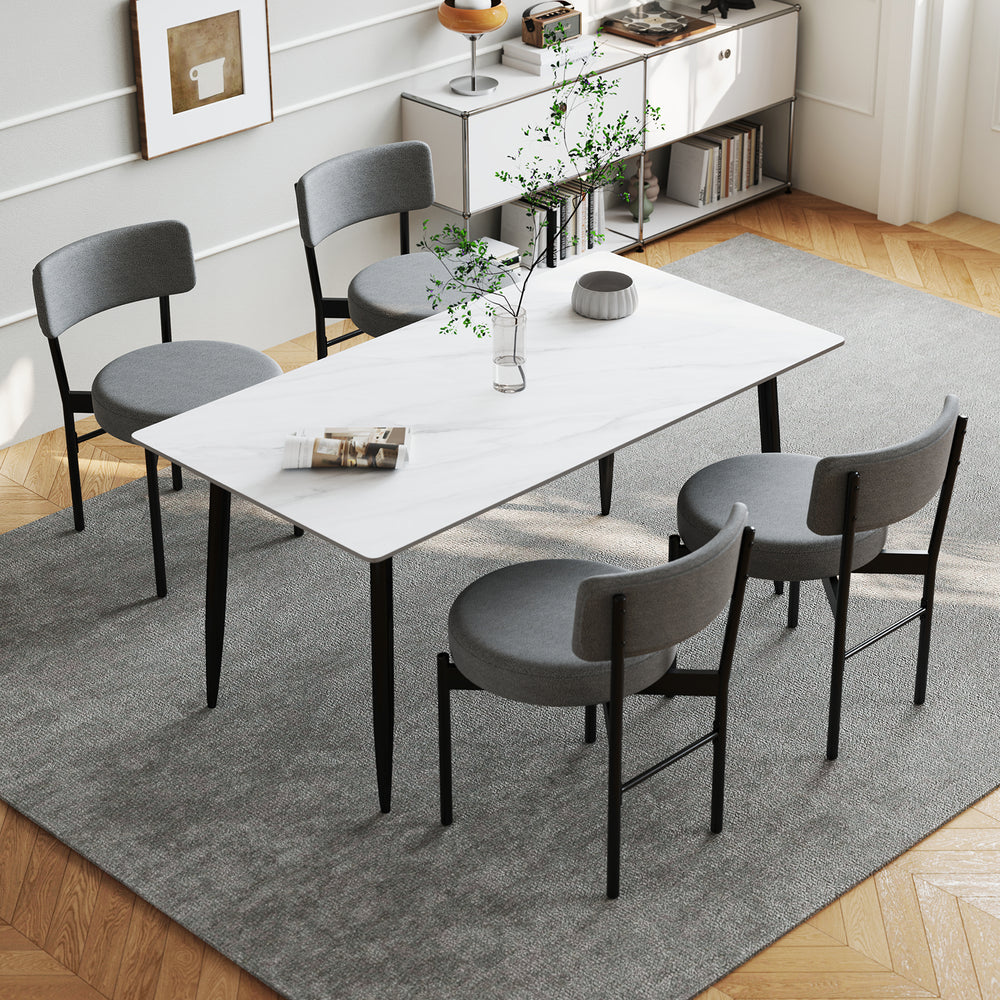 Curved backrest dining chair set in gray with padded seats, perfect for contemporary dining rooms or cafes.