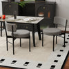 Dining chair set of 2 with gray padded seats and curved backrests, perfect for contemporary dining rooms or cafes.