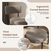 Curved backrest and thick padded seat of gray dining chair, designed for comfort and contemporary style in dining.