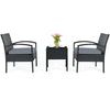 Three-piece outdoor rattan patio conversation set with gray seat cushions, ideal for backyard or balcony relaxation.