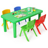 Colorful plastic table and chairs set for kids, featuring a vibrant green table and four stackable chairs in assorted.