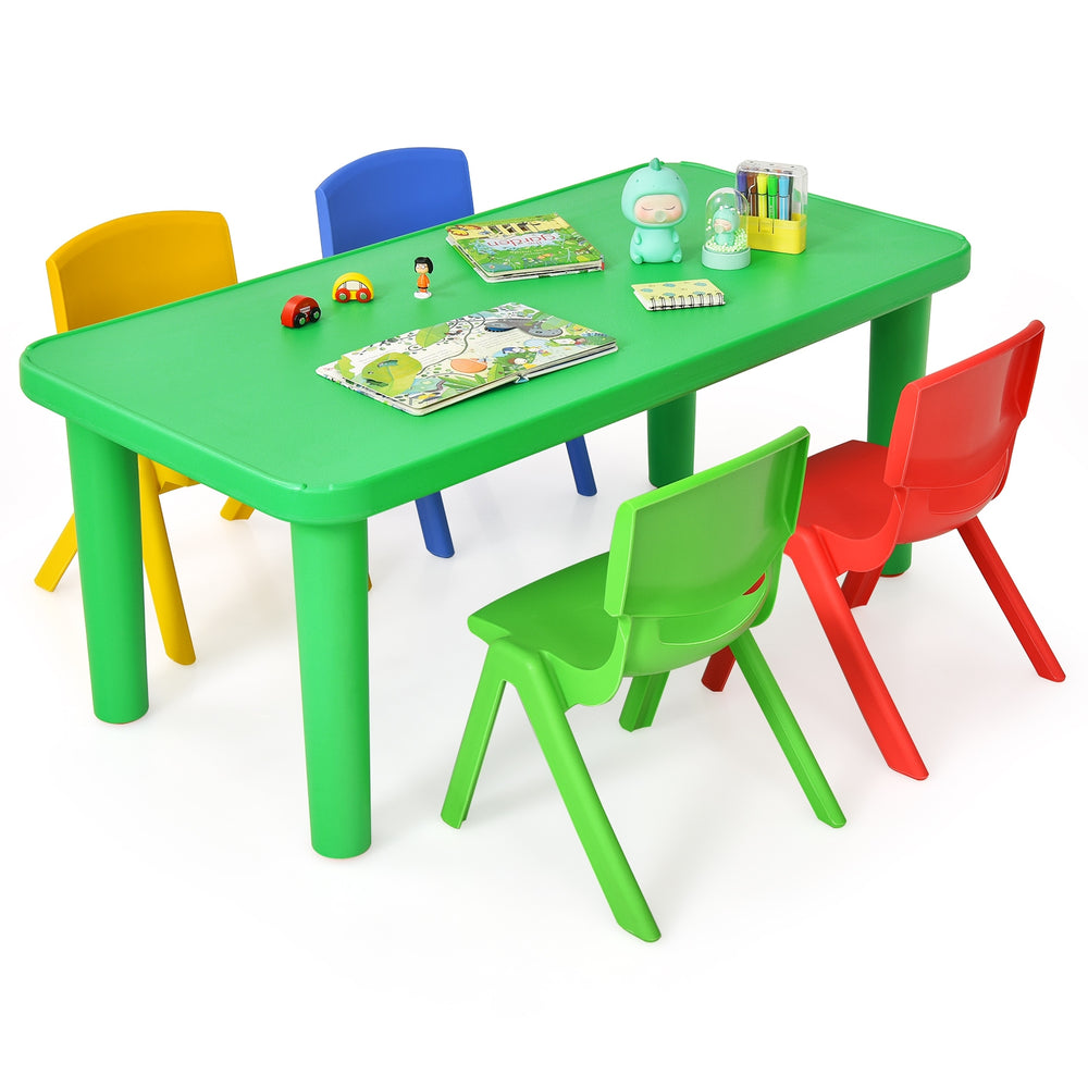 Colorful plastic table and chairs set for kids, featuring a vibrant green table and four stackable chairs in assorted.