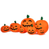 Colorful inflatable Halloween pumpkin patch with LED lights, featuring seven playful designs for festive outdoor.
