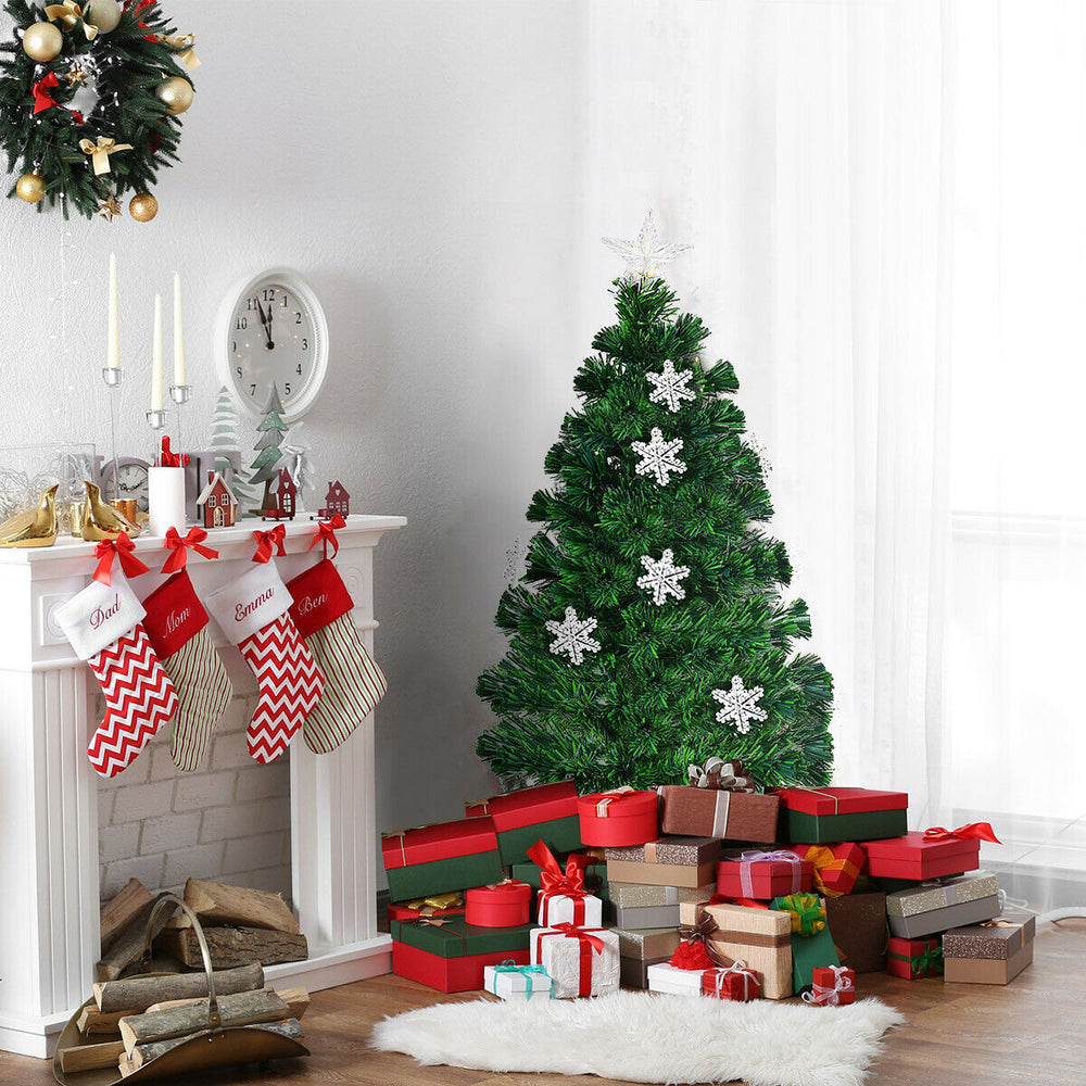 3-foot LED Optic Artificial Christmas Tree with snowflakes, decorated with multi-color lights and surrounded by gifts.