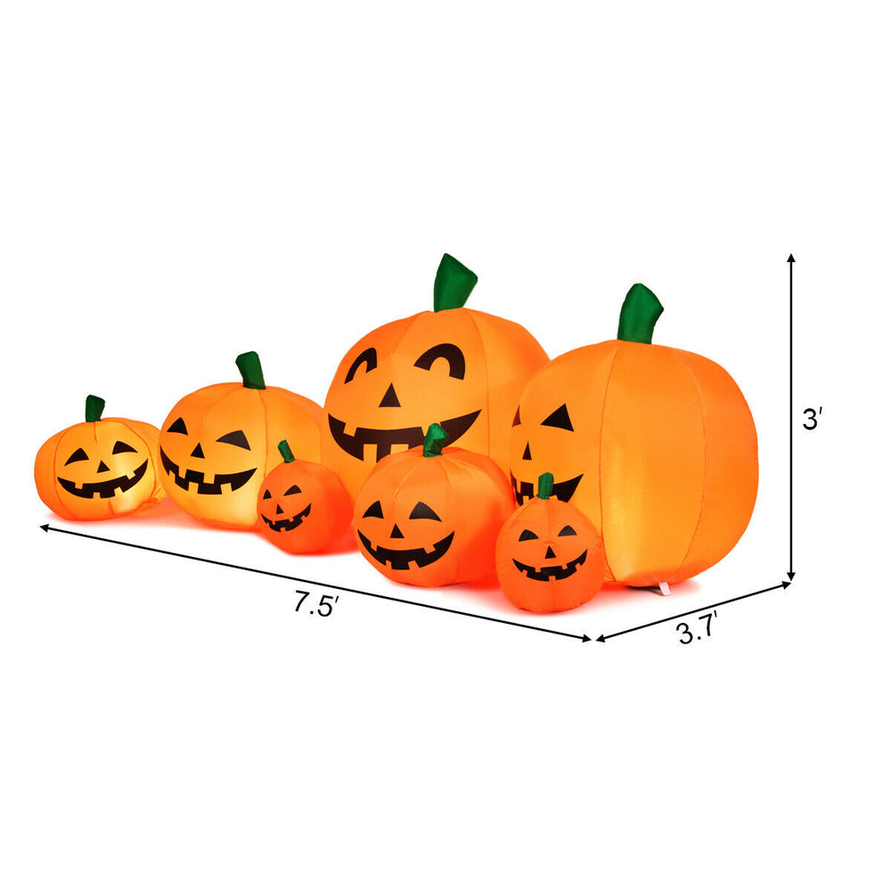 Inflatable Halloween pumpkin patch with 7 pumpkins, LED lights, and weather-resistant design for indoor or outdoor use.