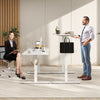 Electric standing desk in white with adjustable height, memory settings, and hanging hooks for organized workspace.