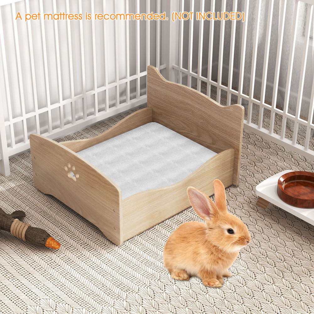 Elevated pet bed frame with ear-shaped headboards, protective guardrails, and compact design for small pets.