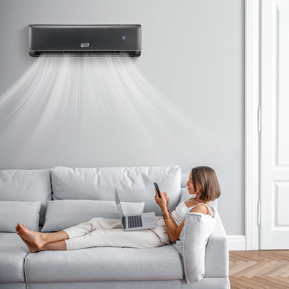 Mini split air conditioner in gray, 12000 BTU, providing cooling and heating for efficient indoor comfort.