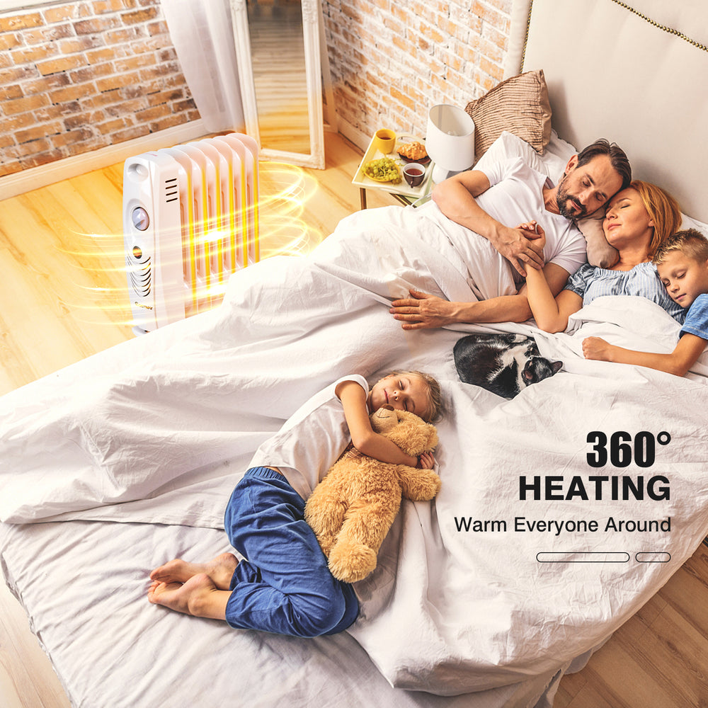 Portable mini electric oil-filled radiator heater providing 360° heating for cozy family moments in bed.