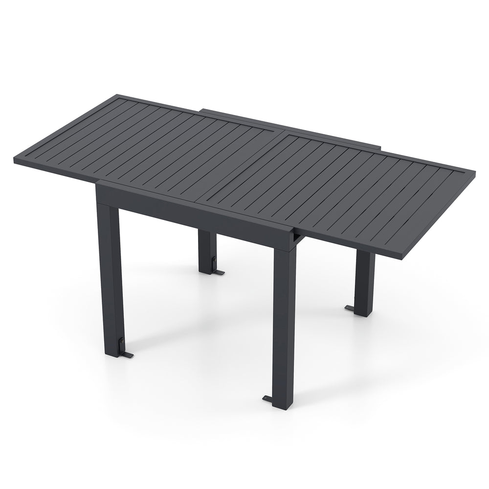 Expandable grey patio dining table for 4-6 people with slatted top and sturdy aluminum legs, ideal for indoor and.