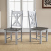 Set of 2 farmhouse chairs with gray rubber wood frame and hollowed backrest, perfect for stylish dining spaces.