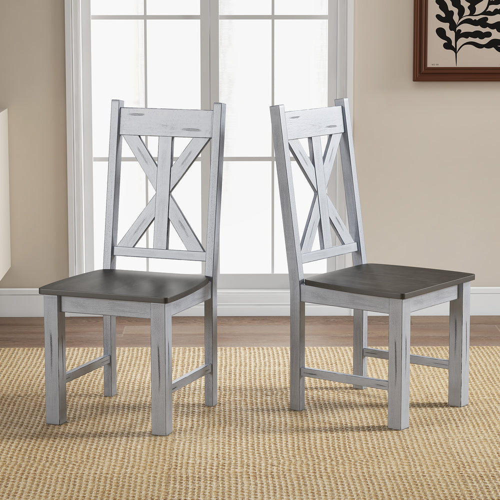 Set of 2 farmhouse chairs with gray rubber wood frame and hollowed backrest, perfect for stylish dining spaces.