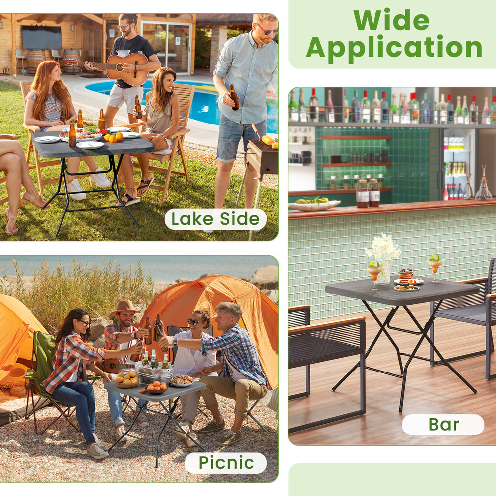 Foldable 2.6FT dining table with wood grain HDPE tabletop, perfect for picnics and lakeside gatherings.