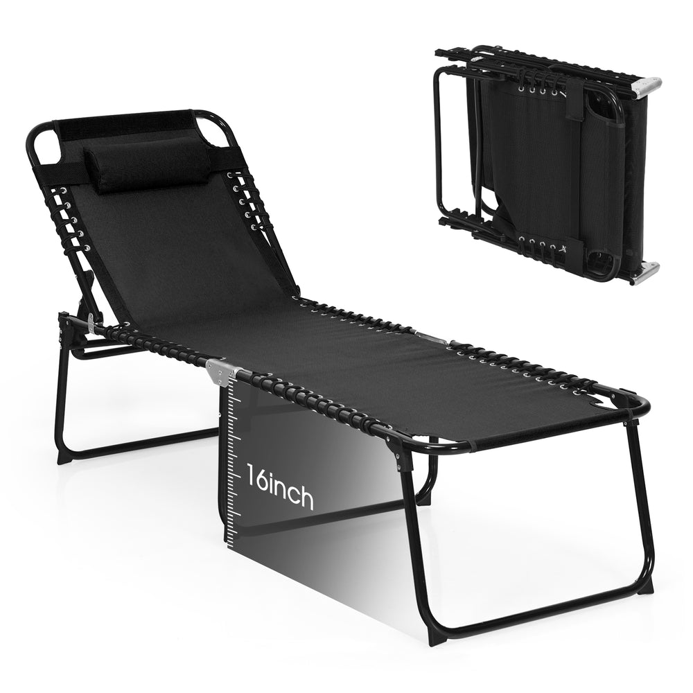Foldable lounge chair in black with adjustable backrest and footrest, ideal for beach or camping use.