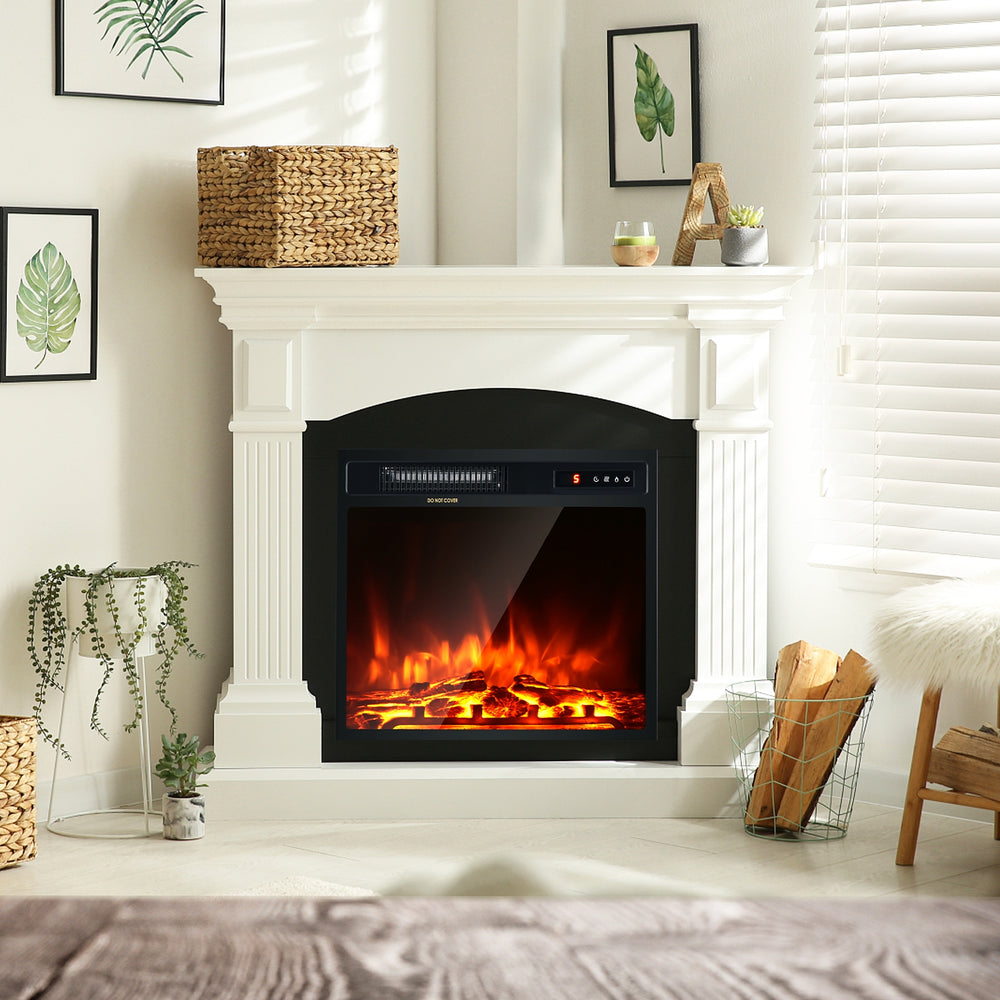 Freestanding 18-inch electric fireplace with tempered glass, remote control, and realistic flame effect for cozy.