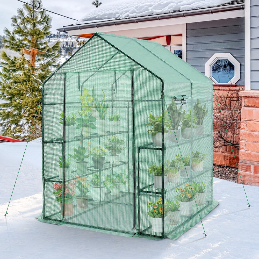 Walk-in greenhouse made of PE material with observation windows, featuring 8 shelves for plants, ideal for gardening.