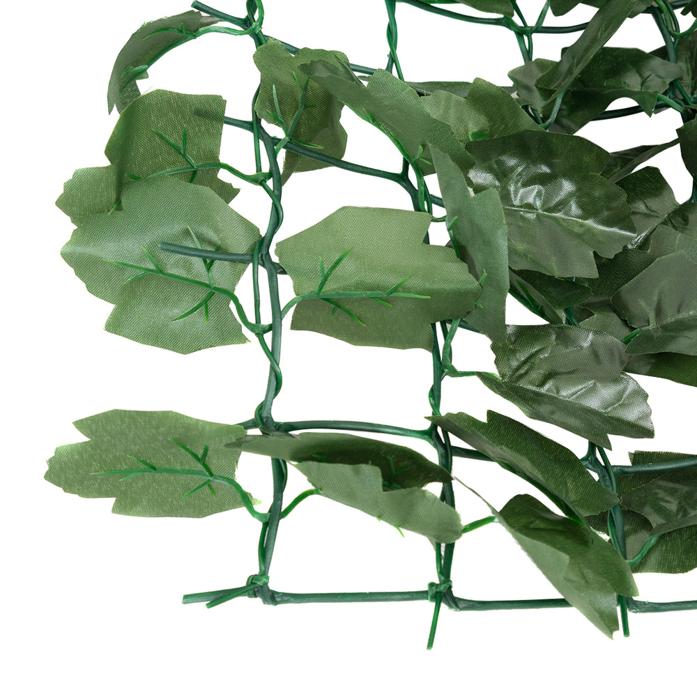 Close-up of faux ivy leaves on a decorative privacy fence, 40 x 95 inches, ideal for indoor and outdoor use.