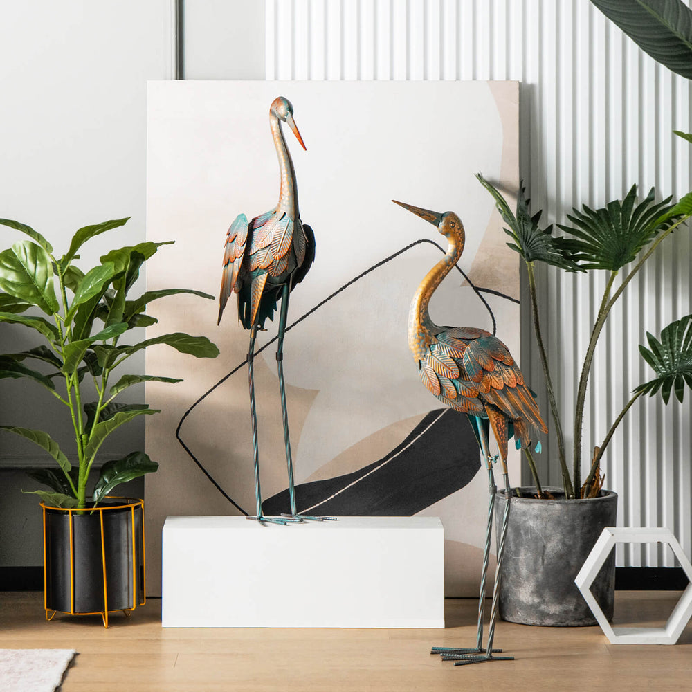 Set of 2 metal crane garden statues with detailed feathers, perfect for charming backyard or lakeside decoration.