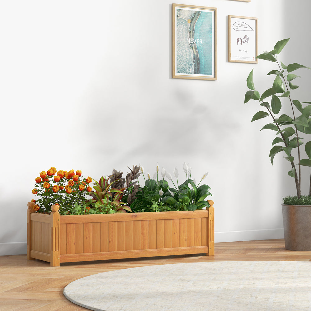 Wooden rectangular garden bed made of fir wood, featuring a drainage system, filled with colorful flowers for outdoor.