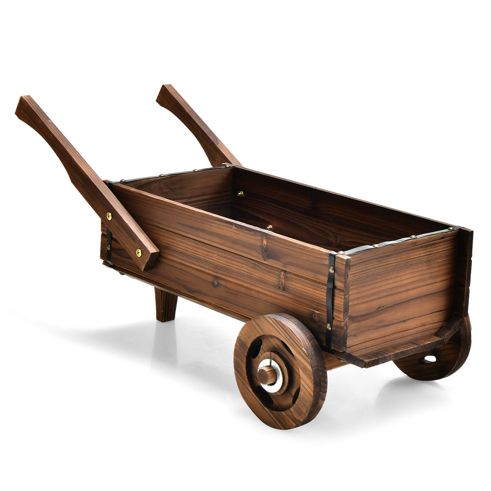 Wooden wagon planter box in rustic brown with wheels and handles, ideal for indoor or outdoor plant display.