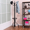 Vintage metal coat hat tree stand with a stylish design, featuring a jacket draped over one of its six hooks.