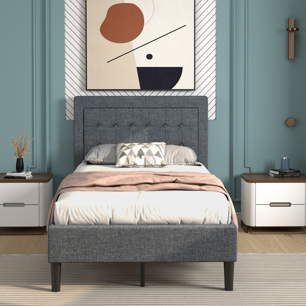 Twin size upholstered bed frame with a stylish button tufted headboard, ideal for kid's rooms or modern guest.