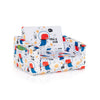 Convertible kids sofa with cartoon pattern, velvet fabric, and side pockets for snacks, perfect for playrooms and.