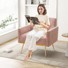 Modern pink velvet accent chair with button tufted back and golden metal legs, ideal for reading and relaxing.