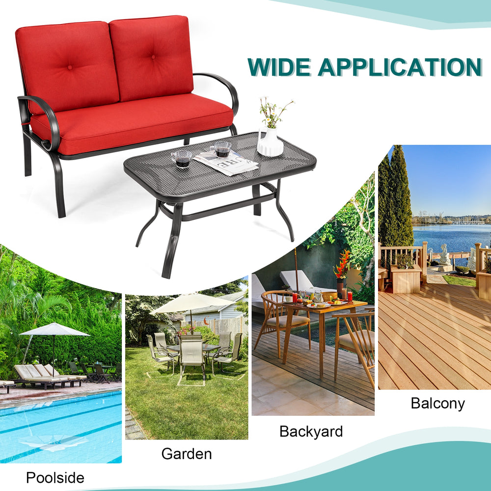 Red cushioned loveseat and coffee table set, made of durable steel, perfect for outdoor patio and garden relaxation.