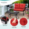 Loveseat with thick red cushions and coffee table, perfect for patio relaxation and outdoor activities.
