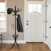 Wood standing coat rack in black with curved hooks and umbrella stand, perfect for stylish entryway storage.