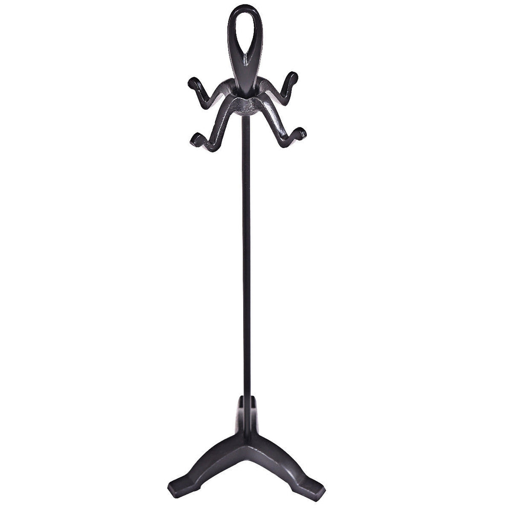 Wrought iron fireplace tool stand with a stylish loop top design, perfect for organizing fireplace accessories.