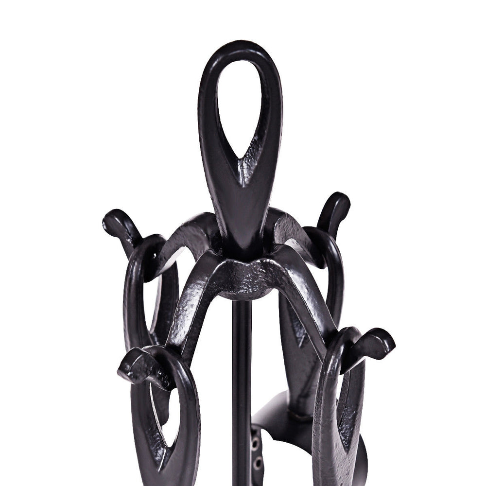 Close-up of the rustic black wrought iron fireplace tools set featuring a stylish loop top handle design for organized.