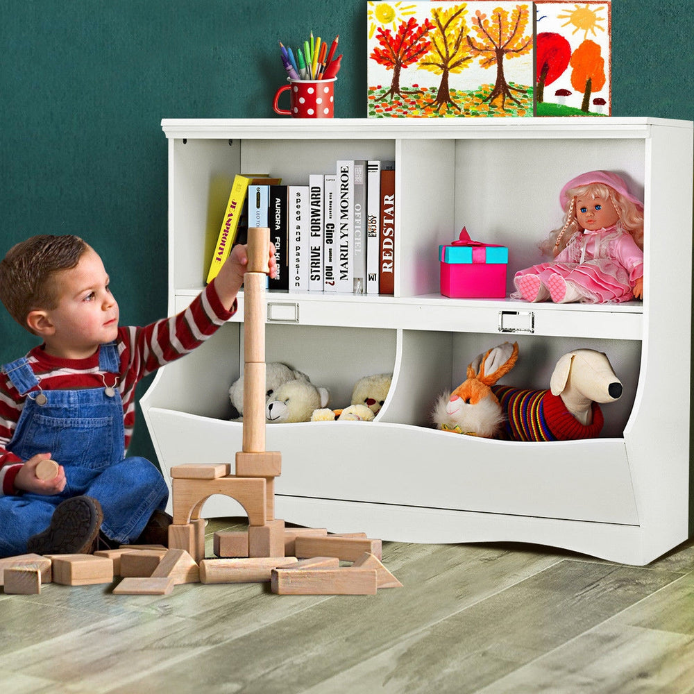 Kids storage unit in white with divided shelves, organizing toys and books for children's playroom or bedroom.