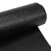 Close-up of a black high-density PVC equipment mat, ideal for home gym use, featuring a textured non-skid surface.
