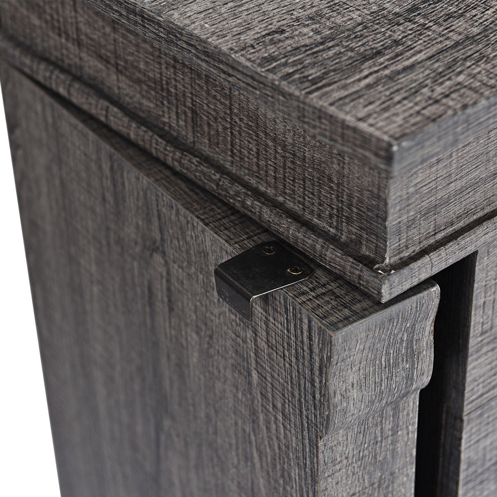 Close-up of the gray standing jewelry cabinet showing the top edge and magnetic door catch for easy closing.