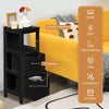 Black wooden floor cabinet with three shelves and two drawers, ideal for bathroom or living room organization.