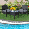 Outdoor rattan patio conversation set with gray cushions, featuring a tempered glass table, ideal for backyard.